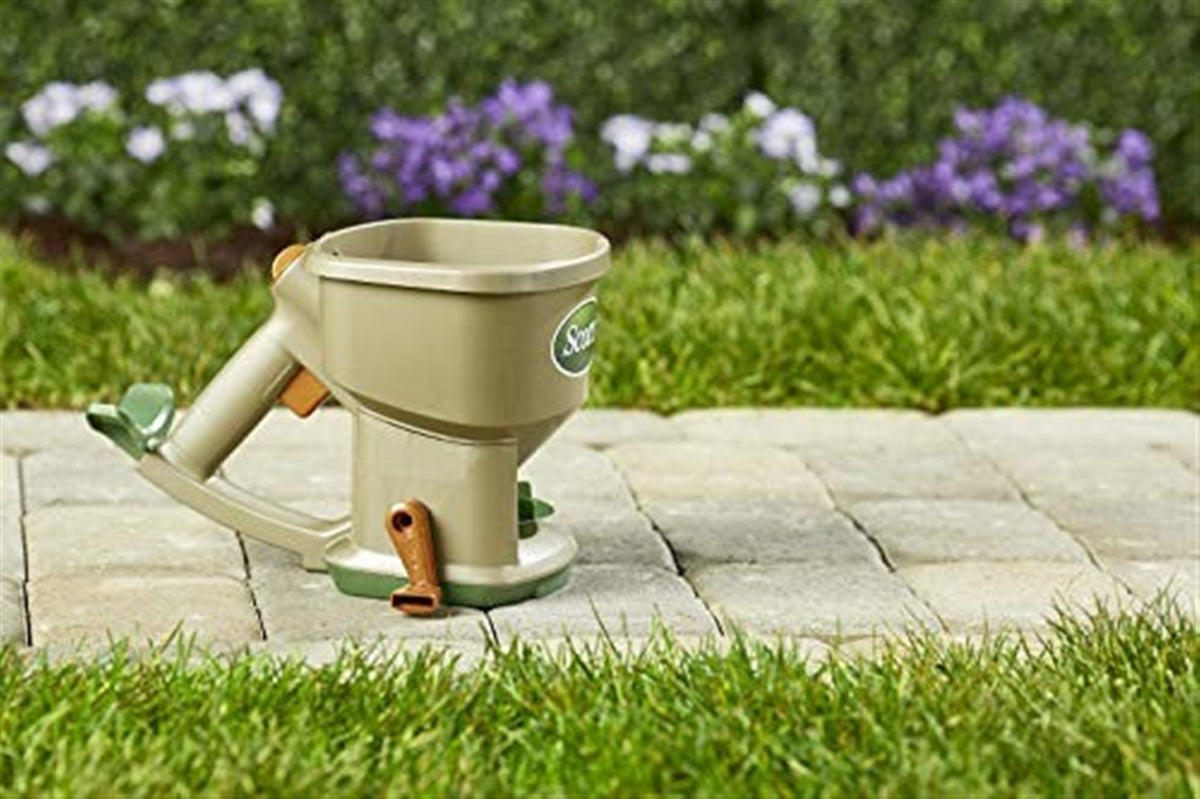Scotts Whirl Hand-Powered Spreader for Grass Seed, Fertilizer, Salt and Ice Melt