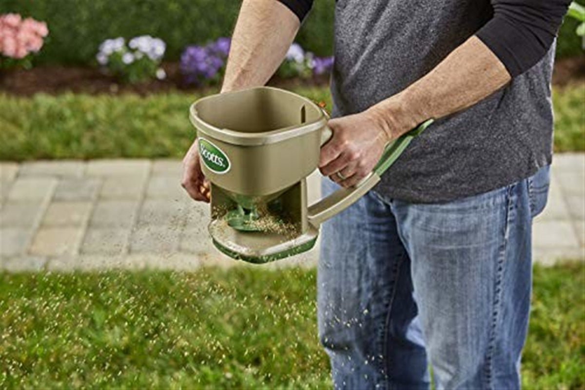 Scotts Whirl Hand-Powered Spreader for Grass Seed, Fertilizer, Salt and Ice Melt