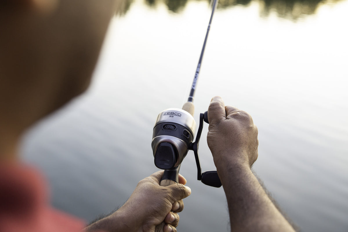 Zebco 33 Cork Handle Spincast Reel and IM6 Graphite Fishing Rod Combo, 6ft 6in 2-piece, Black