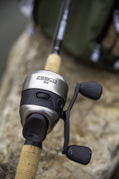Zebco 33 Cork Handle Spincast Reel and IM6 Graphite Fishing Rod Combo, 6ft 6in 2-piece, Black